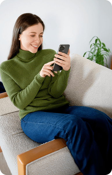 Happy woman shopping online for verified health and wellness products
