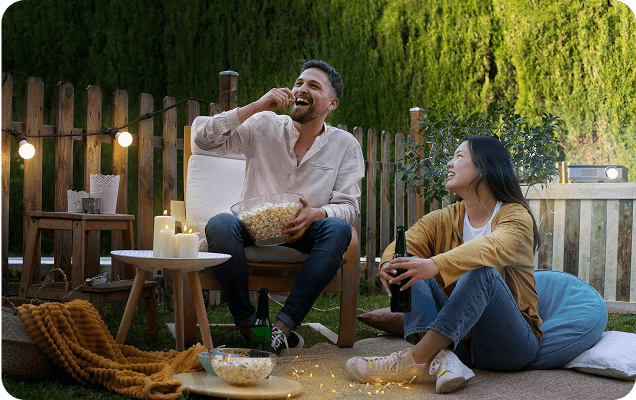 Couple relaxing outdoors enjoying mobility and pain-free wellness lifestyle