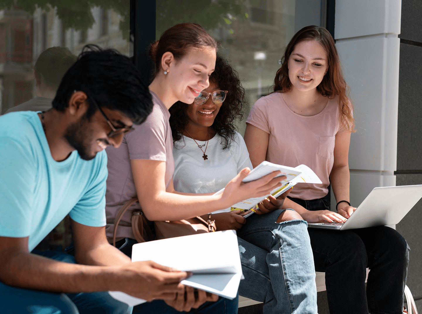 Group of diverse students learning healthy lifestyle habits together outdoors